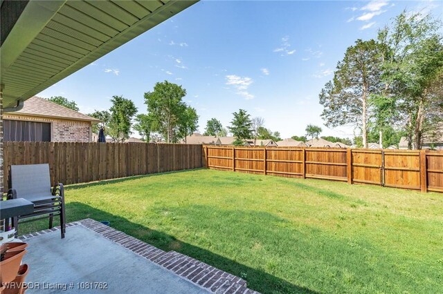 8323 Mclaren Dr, Fort Smith, AR 72916 - fenced backyard with a patio