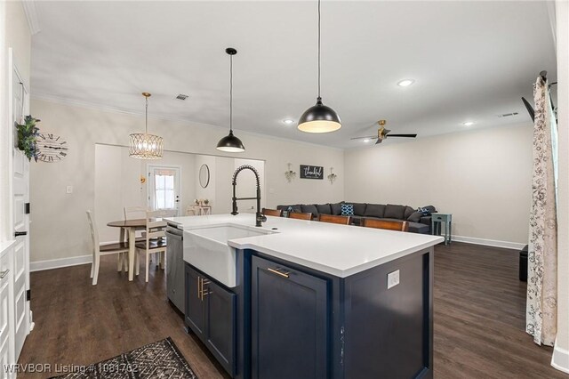 8323 Mclaren Dr, Fort Smith, AR 72916 - kitchen with dark wood-style floors, ceiling fan, light countertops, recessed lighting, and blue cabinets