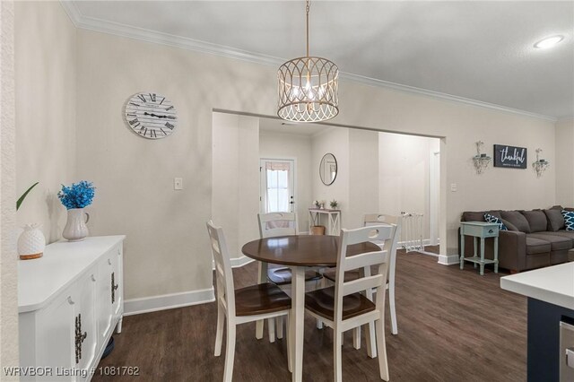8323 Mclaren Dr, Fort Smith, AR 72916 - dining space featuring ornamental molding, dark wood-type flooring, a chandelier, and radiator heating unit