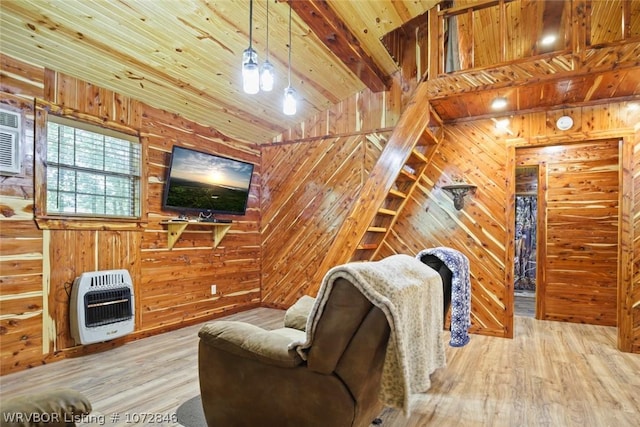 living room with wood ceiling, wooden walls, and heating unit