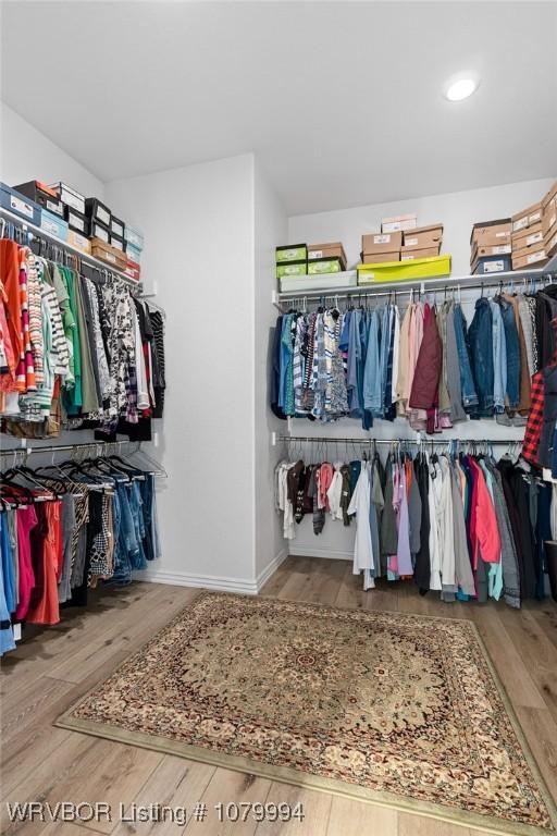 7907 Coltridge Way, Fort Smith, AR 72916 - spacious closet featuring wood finished floors