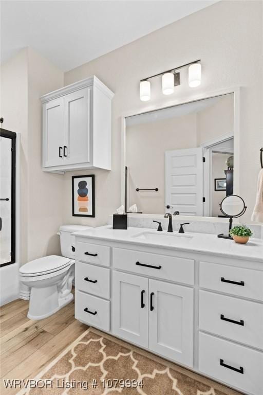 7907 Coltridge Way, Fort Smith, AR 72916 - full bath featuring toilet, wood finished floors, and vanity