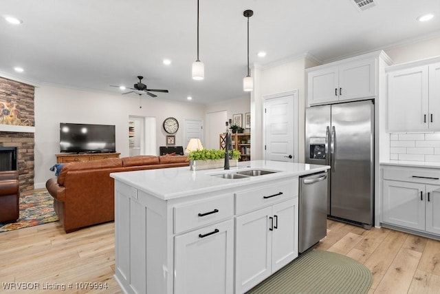 7907 Coltridge Way, Fort Smith, AR 72916 - kitchen with a sink, light wood-style flooring, ornamental molding, and appliances with stainless steel finishes
