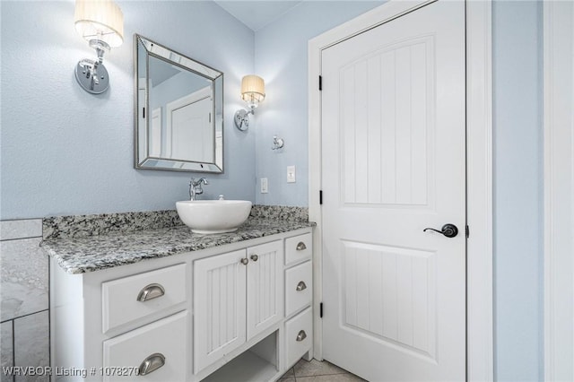 bathroom featuring vanity and tile patterned floors