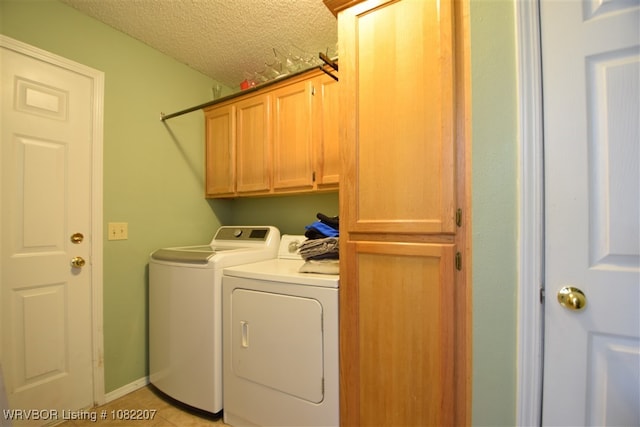104527 S 4670th Rd, Sallisaw, OK 74955 - laundry area with cabinet space, independent washer and dryer, and a textured ceiling