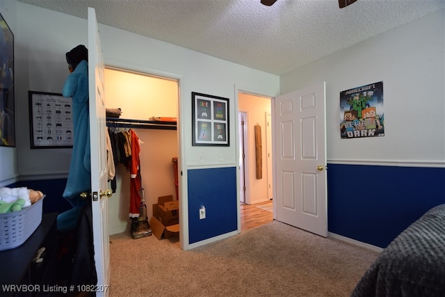 104527 S 4670th Rd, Sallisaw, OK 74955 - bedroom with a spacious closet, carpet, a closet, and a textured ceiling