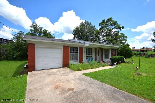 807 S 2nd St, Stilwell, OK 74960 - ranch-style home featuring concrete driveway, a garage, a front yard, and brick siding