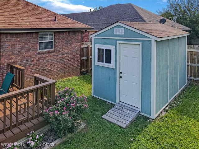 view of outdoor structure with a lawn