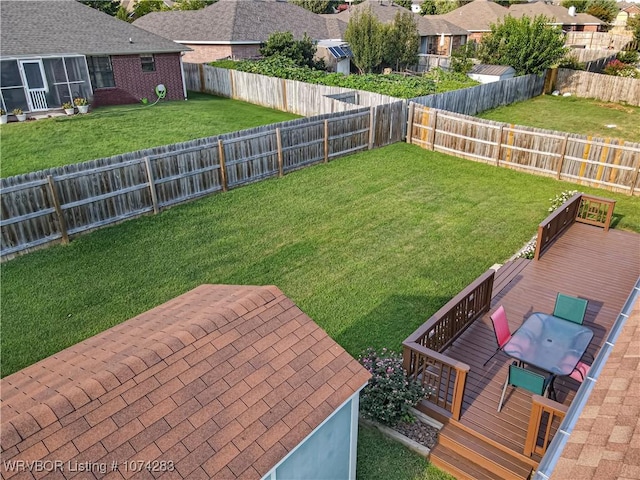 view of yard with a wooden deck