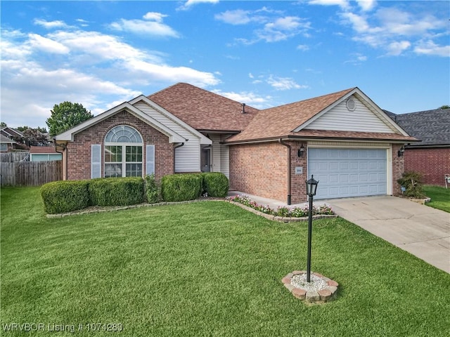 ranch-style home with a front lawn and a garage