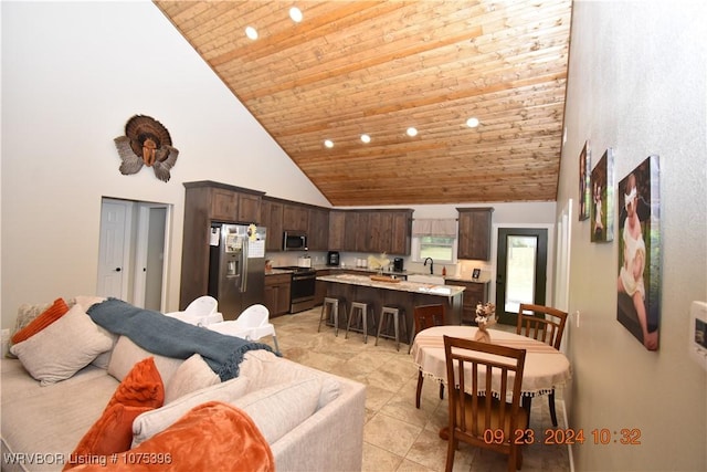 living room featuring sink, high vaulted ceiling, and wood ceiling