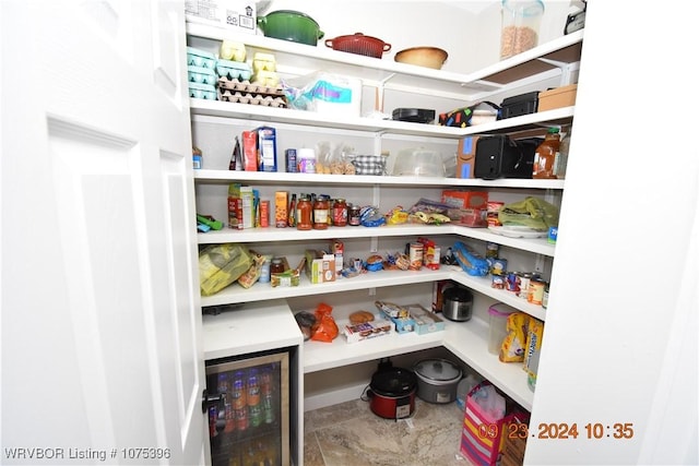 pantry featuring wine cooler