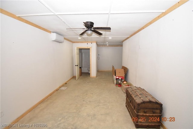 basement featuring carpet, an AC wall unit, and ceiling fan