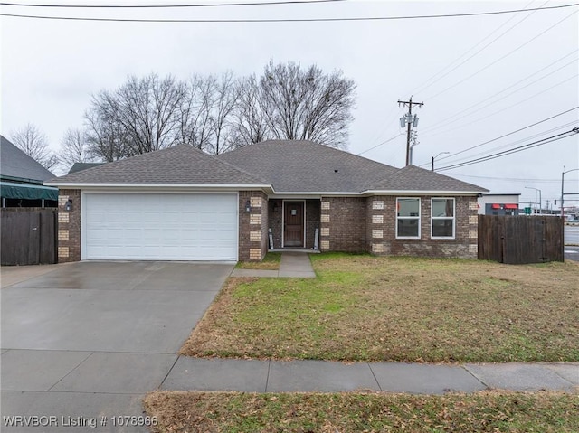 single story home with a garage and a front yard