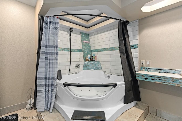 bathroom with a bathing tub and tile patterned floors