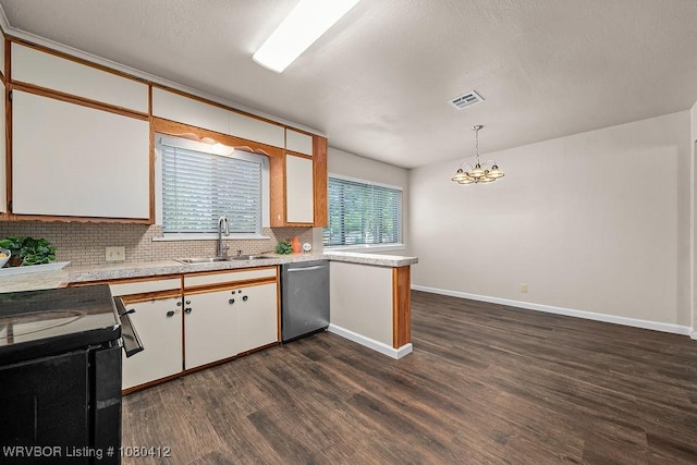 kitchen featuring a sink, tasteful backsplash, visible vents, a notable chandelier, and dishwasher