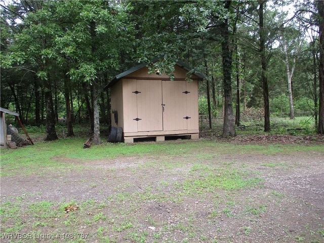 15632 Pink Twist Rd, Ozark, AR 72949 - view of shed with a view of trees