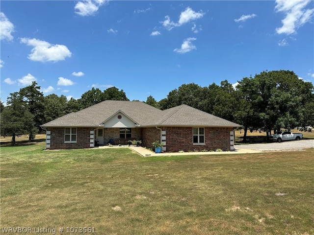 view of front of property with a front lawn