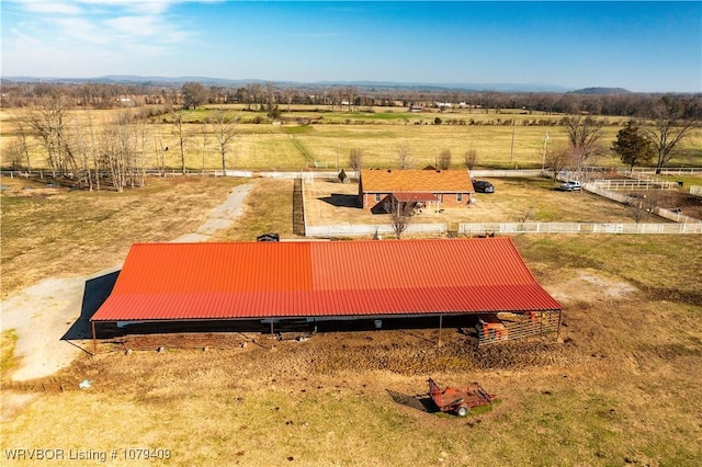 view of storm shelter with a rural view