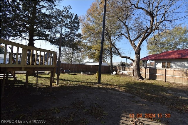 view of yard featuring a deck