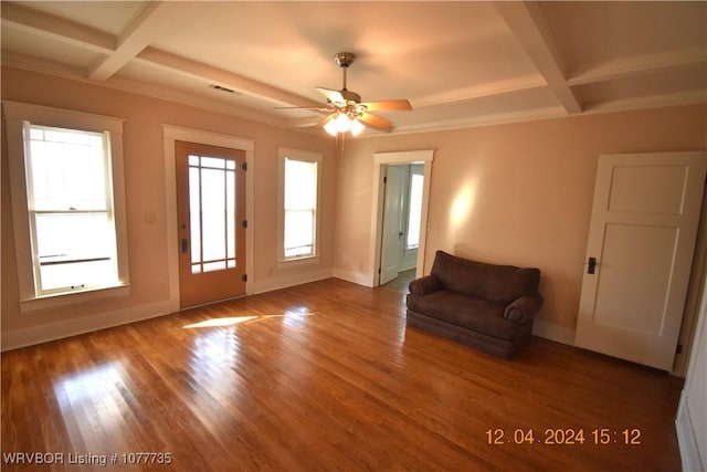 unfurnished room with ceiling fan, beamed ceiling, coffered ceiling, and hardwood / wood-style flooring