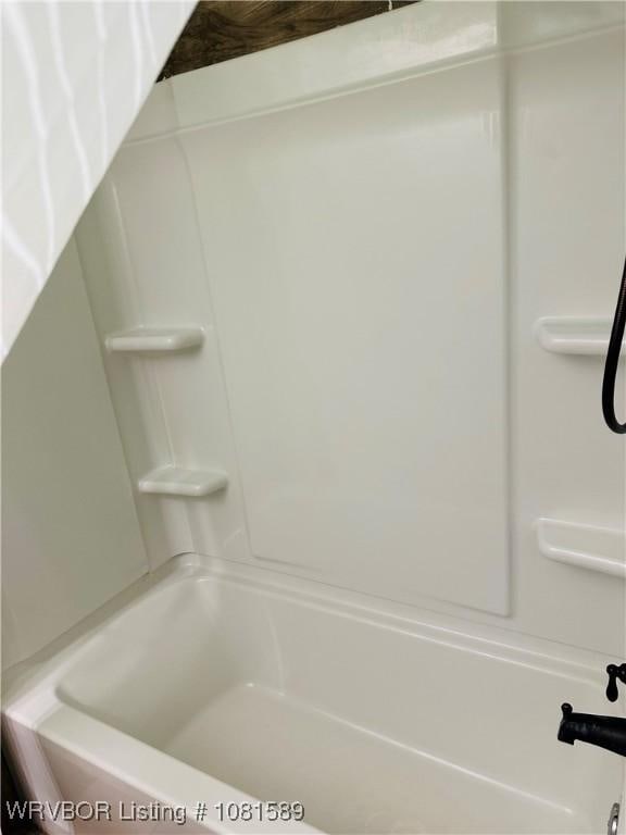 1301 9th St, Barling, AR 72923 - full bathroom with washtub / shower combination