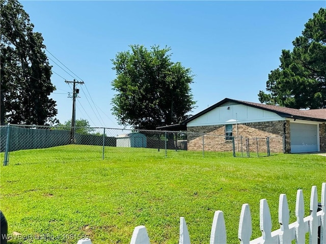 1301 9th St, Barling, AR 72923 - view of yard featuring a garage