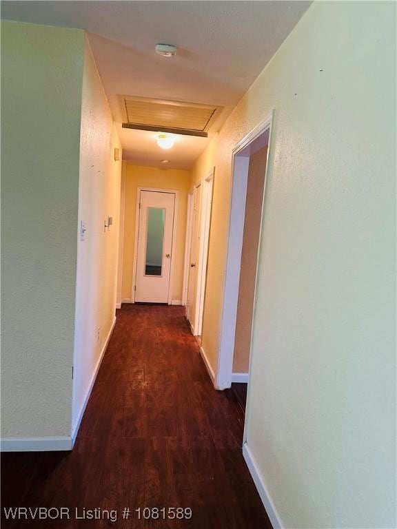 1301 9th St, Barling, AR 72923 - corridor with dark wood finished floors and baseboards