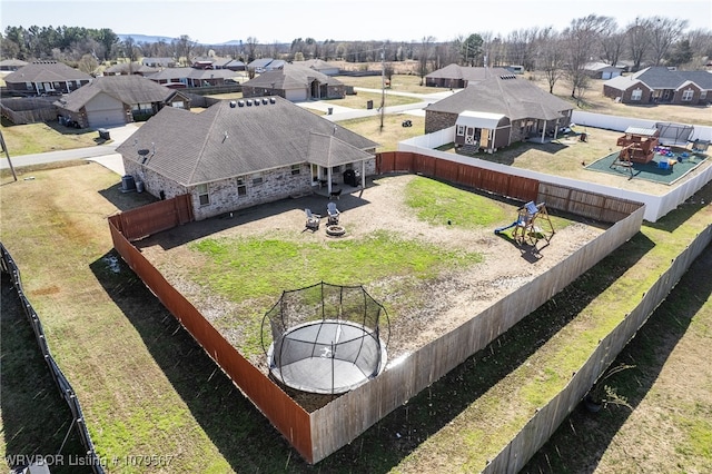 birds eye view of property with a residential view