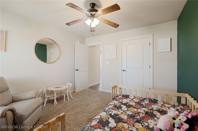 bedroom with carpet, baseboards, and ceiling fan