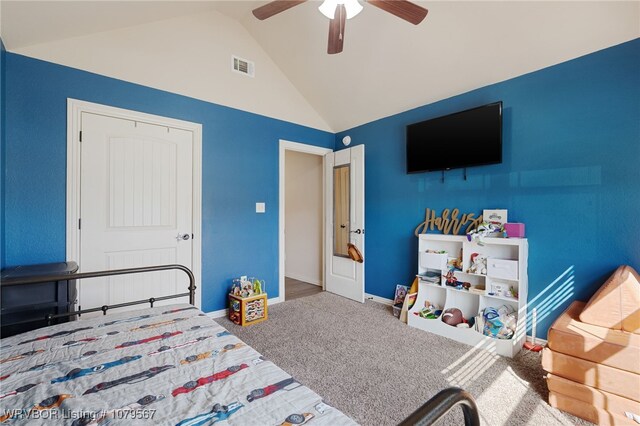 carpeted bedroom featuring a ceiling fan, baseboards, visible vents, and high vaulted ceiling