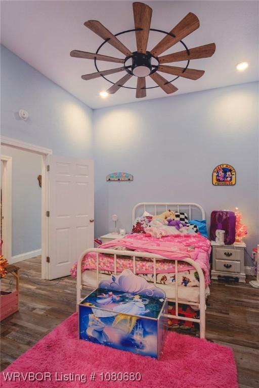bedroom featuring a ceiling fan, recessed lighting, and wood finished floors