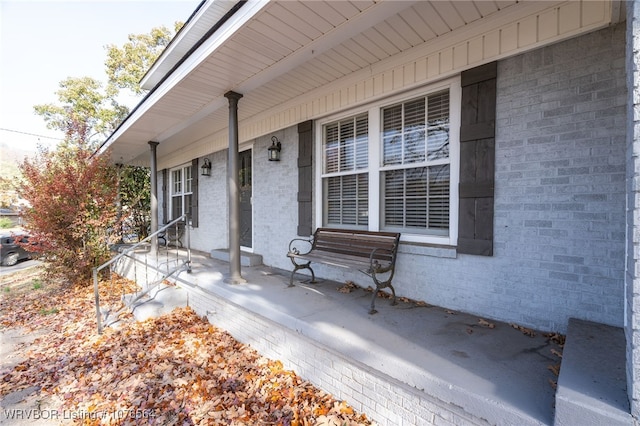 view of patio featuring a porch