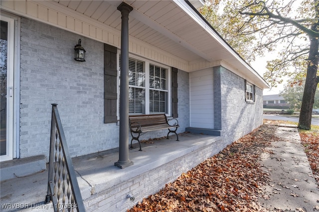 doorway to property with a porch