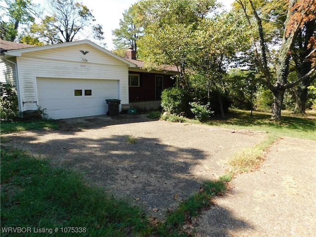 view of home's exterior featuring a garage