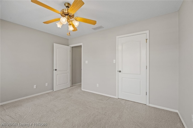 2419 Shealei Cir, Alma, AR 72921 - unfurnished bedroom featuring carpet and a ceiling fan