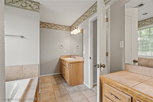 2419 Shealei Cir, Alma, AR 72921 - full bath featuring vanity, a bath, and tile patterned flooring