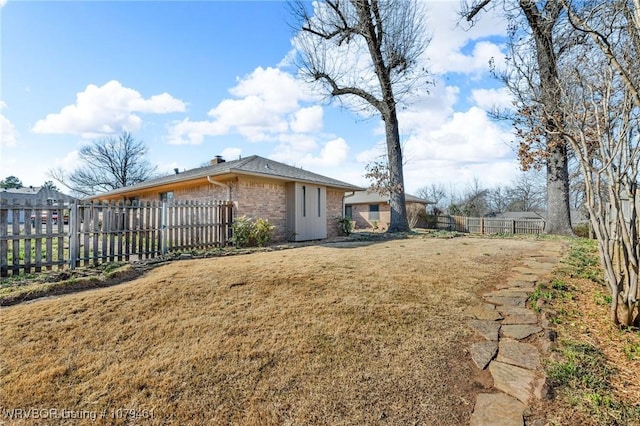 view of yard featuring fence