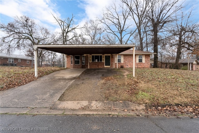 single story home with a carport