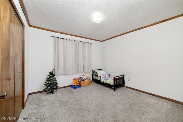 unfurnished bedroom featuring light colored carpet, a textured ceiling, and a closet