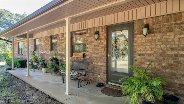 entrance to property with covered porch