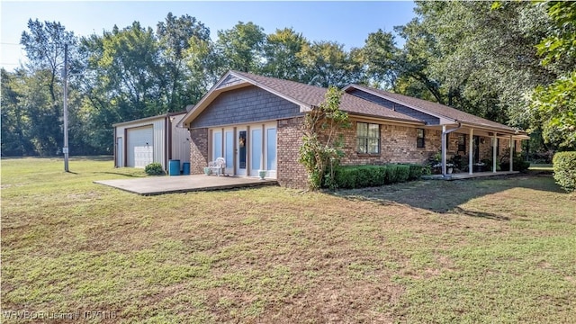 back of property featuring a yard and french doors