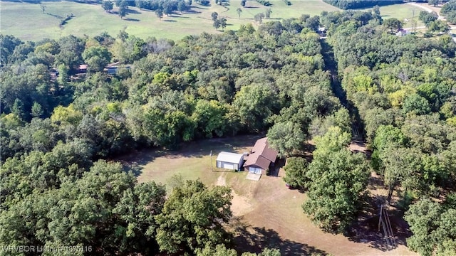 birds eye view of property with a rural view