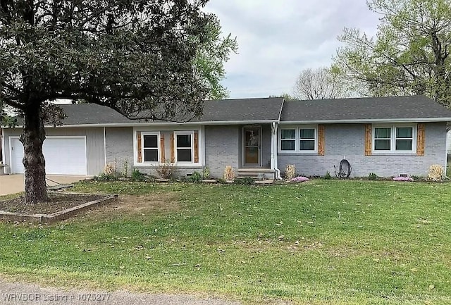 ranch-style home with a front yard and a garage