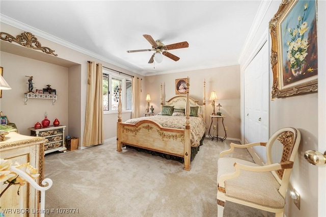 bedroom with ornamental molding, carpet floors, and ceiling fan