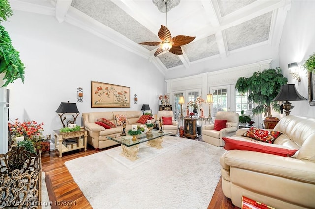 living room with crown molding, ceiling fan, beam ceiling, high vaulted ceiling, and wood-type flooring