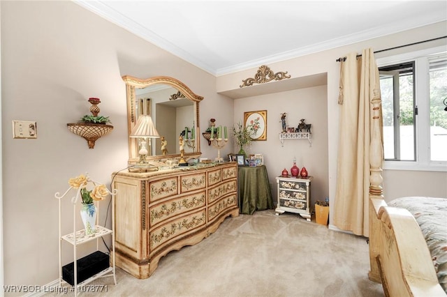 bedroom with carpet floors and ornamental molding