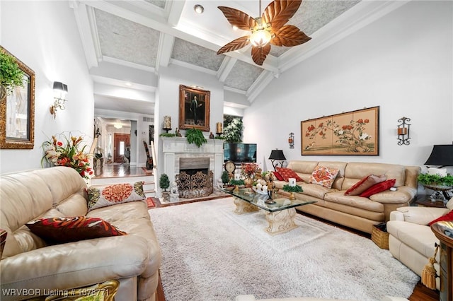 living room featuring crown molding, high vaulted ceiling, and beamed ceiling