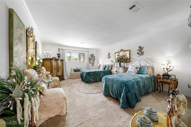 bedroom featuring crown molding and carpet