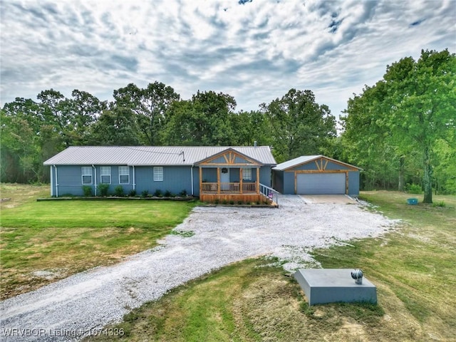 single story home with covered porch and a front yard